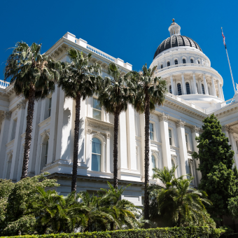 California state capitol building with palm trees
